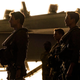 Tom Cruise as Pete “Maverick” Mitchell, Miles Teller as Bradley “Rooster” Cradshaw, Monica Barbaro as “Phoenix,” and Glen Powell as “Hangman” in Top Gun: Maverick